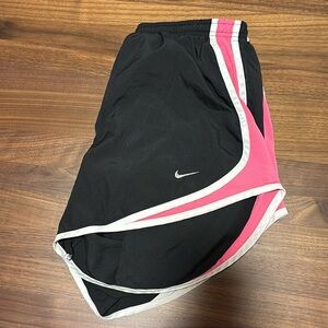 Black and pink Nike shorts in a medium